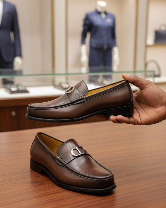 Side view of Men's Loafers in brown leather with CD Icon buckle